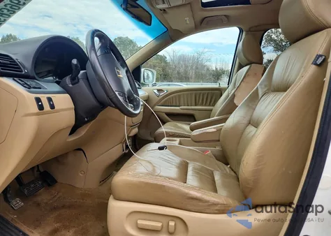 2009 Honda Odyssey Exl z USA, uszkodzony, nr VIN 5FNRL386X9B410926